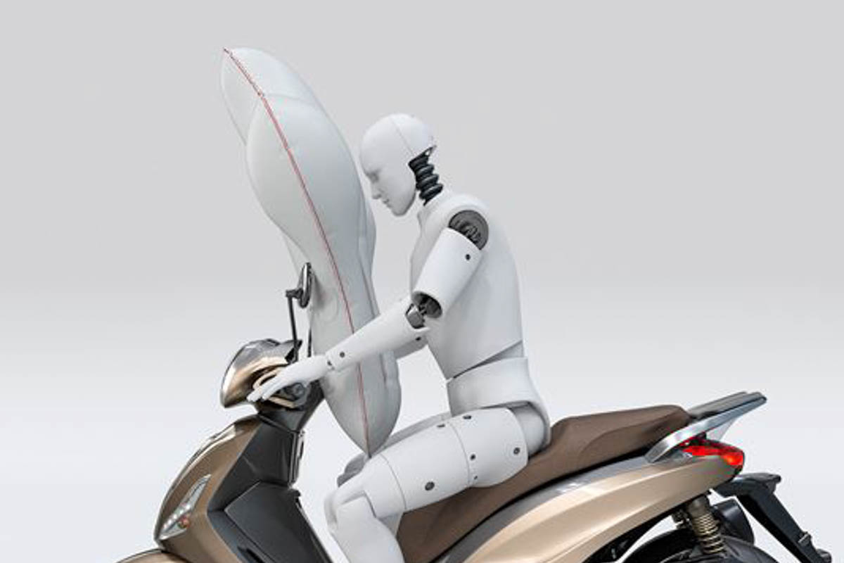 Autoliv Yamaha motorcycle airbag system integrated into Tricity 300 scooter panel
